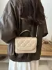 Bolso pequeño de alta gama con estampado de rombos, nuevo bolso de hombro en relieve de moda 2026, bolso cuadrado pequeño versátil para ventas transfronterizas