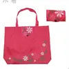Fábrica para bolsa de mano impermeable de tela Oxford para regalos, bolsa de compras plegable de moda colorida con flores, bolsa de almacenamiento de protección ambiental portátil