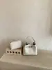 Comercio Exterior Transfronterizo Bolso Pequeño Estilo Coreano para Mujer 2026 Nuevo Diseño de Nicho Bolso de Mano Bolso Cubo Bolso de Hombro Cruzado Elegante