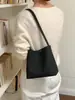 Bolso de axila de nicho de alta gama para mujer, nuevo modelo de verano 2026, bolso de cubo de axila de un solo hombro súper popular y exquisito