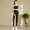 Conjunto de chaleco de yoga de encaje de un solo hombro para mujer con almohadillas en el pecho, nuevo diseño de empalme de encaje, ropa de fitness sexy, elegante y deslumbrante