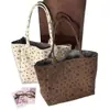 Bolsa de Lona Grande Capacidade com Laço em Formato de Coração Nova 2025 para Mulheres Versátil de Ombro Moda Bolsa de Mão Bolsa Tote para o Dia a Dia