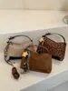 Bolso de mano personalizado estilo coreano transfronterizo para mujer, nuevo modelo 2026, bolso cruzado elegante y chic, bolso tipo almohada de moda
