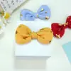 Nuevo moño pequeño con estampado dorado, adorno de estrella de cinco puntas, accesorio para ropa, accesorio de decoración para muñecas, accesorio para moño DIY