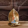 Directo de fábrica original cerámica pequeño león chismoso quemador de incienso varilla de incienso oro porcelana varilla de incienso nuevo suministros para sala budista