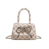 Bolsa de Mão Mini Estilo Novo Primavera 2026 Bolsa Quadrada Pequena Moda Feminina Bolsa de Ombro com Corrente Transversal Importação