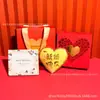 Oro Puro 999 Creativo 520 Qixi Exquisita Moneda de Oro en Forma de Corazón Set de Regalo Decoración del Día de San Valentín Personalizado Venta al por Mayor