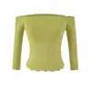 Conjunto de top de tricô ombro a ombro e saia puramente atraente e sexy com um design único apresentando um recorte e uma silhueta ajustada