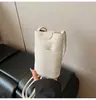 2025 Bolsita Cuatro Estaciones Bolsita para Teléfono Bolso de Moda Versátil Bolso de Hombro Único Cruzado Bolsita Pequeña con Textura de Lichi Bolso Cubo Texturizado