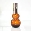 Suministro puntual color té color calabaza simple botella de loción calabaza doble botella de cosméticos botella de aceite de presión botella pulverizadora