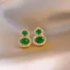 Nuevos Exquisitos Pendientes de Tachuela de Calabaza Hueca con Circonita Esmeralda Chinos Pendientes Elegantes de Moda para Mujer Joyería para Orejas de Lujo Ligero y de Alta Gama
