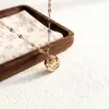 Precio Especial de Venta Caliente Acero de Titanio de Lujo Alta Calidad Incrustado de Perlas Personalizado Doble Capa Mate Borla Mariposa Anillo para Labios para Mujeres