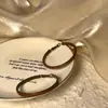 Pendientes de aro Maillard con atmósfera otoñal e invernal 2024, nuevos pendientes exagerados con diseño de nicho y explosión de temperamento alto.