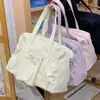 El nuevo modelo de este bolso de un solo hombro es un bolso de mano de gran capacidad para estudiantes universitarios, simple, elegante y casual, una bolsa tote para laptop para mujeres