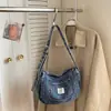 Bolso de hombro de mezclilla retro lavado, gran capacidad, bolso cruzado casual, bolso tipo bollo estilo estudiante, nueva colección primavera 2026