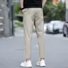 Loja de outlet de comércio exterior calças casuais cropped masculinas primavera-verão para pessoas de baixa estatura, calças retas slim fit ligeiramente afuniladas, calças longas finas, calças masculinas de 9 pontos