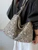Bolsa feminina de estilo casual, novo modelo outono 2026, bolsa de ombro com estampa de leopardo de nicho e super popular, bolsa tote de grande capacidade para o dia a dia