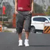 Pantalones Cargo de Mejor Venta Europeos y Americanos en Ebay Talla Europea Pantalones de 7 Puntos Talla Grande para Hombre Pantalones Cropped Pantalones con Múltiples Bolsillos de Solapa Pantalones de Exterior