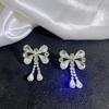 Brincos com Micro-incrustação de Diamantes Completos 2023 Novos Tendência Primavera e Verão Elegantes de Alta Qualidade Brincos de Prata de Luxo Leve para Mulheres com Laço