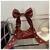 Bolso de Mano Retro con Lazo de Remaches para Mujer 2025 Verano Nueva Moda Trendy Elegante Estilo Extranjero Bolso de Hombro Sobaco