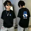 Camiseta de algodón 100% pura para niño, nueva de 2026, ropa infantil, imitación de dos piezas, manga larga, rayas, retazos, para primavera y otoño