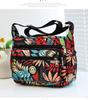 Bolsa de pano de flores Nova bolsa crossbody feminina Pano Oxford Bolsa de mãe de meia-idade e idosa Bolsa Bolsa de ombro multicamadas Bolsa de lona
