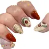 Manicura Transfronteriza Europea y Americana Otoño e Invierno Uñas Portátiles Moda Simple Flores Hojas Patrón Dorado Almendra Uñas Portátiles Al Por Mayor