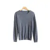 Suéter de punto básico de alta gama para mujer, cuello redondo, 100% lana pura, color liso, holgado, adelgazante, otoño e invierno 2026