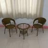 Silla sencilla de ratán al por mayor sala de estar tienda de té con leche mesa de centro ocio combinación de mesa redonda juego de tres piezas de silla de ratán para exterior
