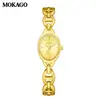 Reloj de pulsera estilo brazalete Moka de alta gama, alto valor estético, incrustado de diamantes, resistente al agua, elegante, reloj redondo compacto, simple reloj de pulsera de cuarzo para mujer