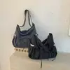 Bolsas Femininas Novas Outono/Inverno 2026 Bolsas de Ombro Casuais Retrô Bolsas Dumpling Design de Nicho Bolsas Transversais da Moda