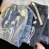 Venta al por mayor transfronteriza estilo Hong Kong marca de moda jeans con estampado de estrellas, primavera/verano finos versátiles holgados rectos pantalones casuales