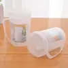 Taza de leche a prueba de polvo de un dólar con tapa, vaso de plástico redondo transparente con asa