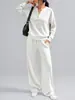 Conjunto deportivo casual de dos piezas para mujer, otoño e invierno 2026, transfronterizo europeo y americano, nuevo diseño de moda, top holgado de manga larga y pantalón de pierna ancha