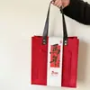 2026 Ano do Cavalo Bolsa de Feltro Novo Estilo Chinês Bolsa de Presente Vermelha Bolsa Tote para Reunião Anual da Empresa com Impressão de Logo