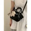 Bolsa Única com Textura Pequena Tote Bag para Mulheres 2026 Estilo Novo da Primavera Bolsa de Cesta Simples Ombro Transversal Bolsa Asa
