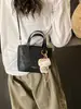 Bolso de Mujer 2025 Otoño Nuevo Estilo Bolso Cruzado Bolso Cubo Retro Elegante de Alto Valor de Moda Nicho Bolso de Hombro de Mano