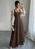 Vestido largo de estilo francés con bloques de color y lazo, de estilo hada, transfronterizo europeo y americano 2026, con corpiño negro puro y diseño de cintura alta