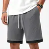Pantalones cortos casuales de gofre para hombre transfronterizos con dobladillo de color contrastante, cintura elástica, corte recto, longitud media, pantalones de moda de verano
