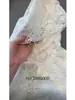 Camisa de Encaje con Capucha de Manga Larga de Uso Rudo Estilo Francés para Mujer, Modelo Nuevo Primavera y Otoño 2026, Top Camiseta Base Interior Único y Súper Elegante