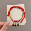Pulseira de corda colorida zongzi do Festival do Barco-Dragão 2026 novo modelo pulseira trançada artesanal étnica infantil atacado corda vermelha