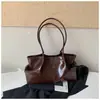 Bolsa tote de cor sólida transfronteiriça, nova coleção outono/inverno, couro encerado, casual e elegante para o dia a dia, bolsa de ombro retrô na cor marrom Melard
