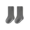 Meias infantis primavera/outono/inverno antiderrapantes cor sólida lisas meias de bebê ins para meninos e meninas crianças médias e grandes meias de algodão até a panturrilha