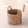 Maceta de paja en existencia, cesta de almacenamiento para sala de estar, maceta para balcón, cesta de almacenamiento de flores secas, cesta de mano al por mayor