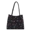 Bolso tipo cubo estampado dulce modelo nuevo 2026, gran capacidad, bolso de hombro moderno y versátil, bolso de alta gama para el día a día, bolso tote para mujer