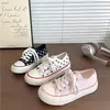 Tênis de lona estilo americano retrô com estrelas para mulheres, novo modelo versátil outono 2026, tênis casual estudantil, sapatos brancos