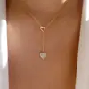 Collar con Colgante de Pedrería en Forma de Corazón para Mujer, Cadena Clavicular Hueca de Lujo Ligero, Joyería de Alta Gama Moderna y Tendencia