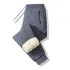 Pantalones de algodón ultrasónicos transfronterizos, pantalones casuales de algodón con borrego de invierno para hombre, talla grande, casual, holgados, forrados de polar, pantalones de correr engrosados