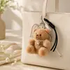Bolsa de Cadena Trenzada de Cuero con Forma de Corazón, Colgante Llavero, Accesorio de Moda Creativo Transfronterizo Europeo y Americano de Peluche Oso de Peluche para Mujeres