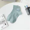 Promoção Relâmpago Tendência da Moda Meias Casuais Esportivas Masculinas Absorventes de Suor Resistentes a Odores Baixas Meias de Neve Curta Cor Sólida Listradas Atacado